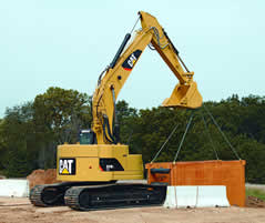 Caterpillar : circuits hydrauliques auxiliaires en standard et cabines ROPS 