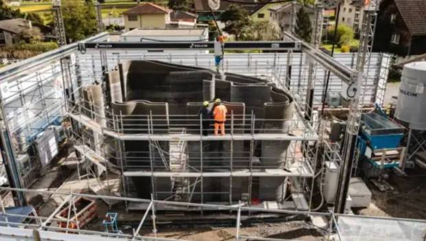 Holcim achève le premier bâtiment imprimé en 3D sur site en Suisse